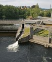 A hydropower plant. Lake with lots of water and with walls around it