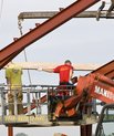 A construction site with a worker